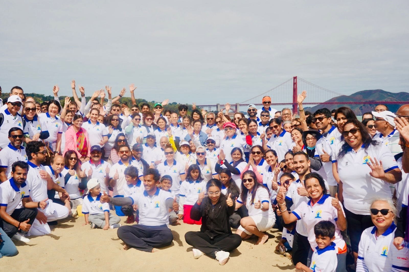 Where the Pacific meets the pose — Yoga at the Golden Gate.  On June 20, 2026, @CGISFO marked the 12th #InternationalDayofYoga2026 at Crissy Field East Beach, San Francisco, against the magnificent backdrop of the iconic Golden Gate Bridge emerging through the morning fog.