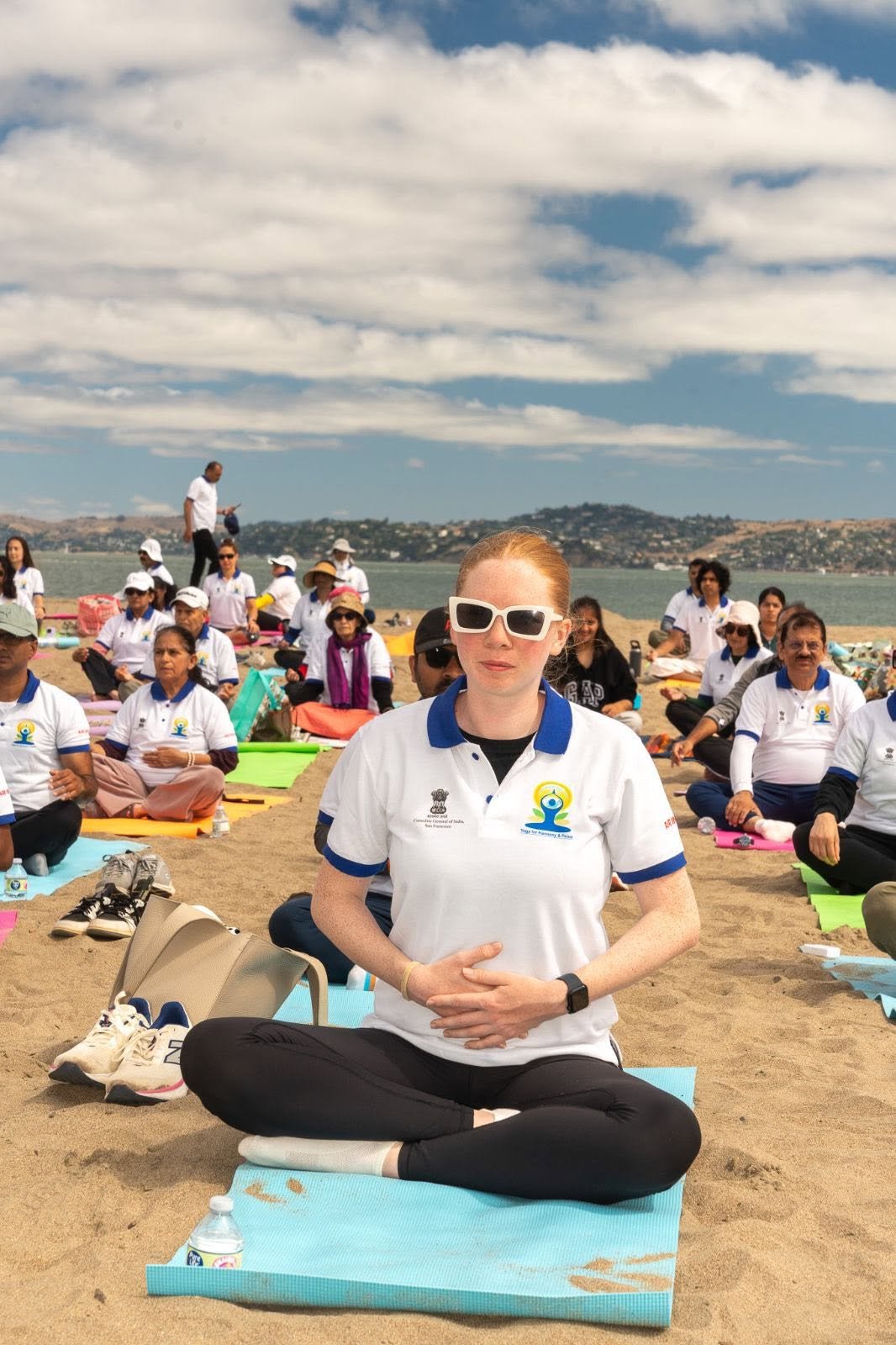 Where the Pacific meets the pose — Yoga at the Golden Gate.  On June 20, 2026, @CGISFO marked the 12th #InternationalDayofYoga2026 at Crissy Field East Beach, San Francisco, against the magnificent backdrop of the iconic Golden Gate Bridge emerging through the morning fog.